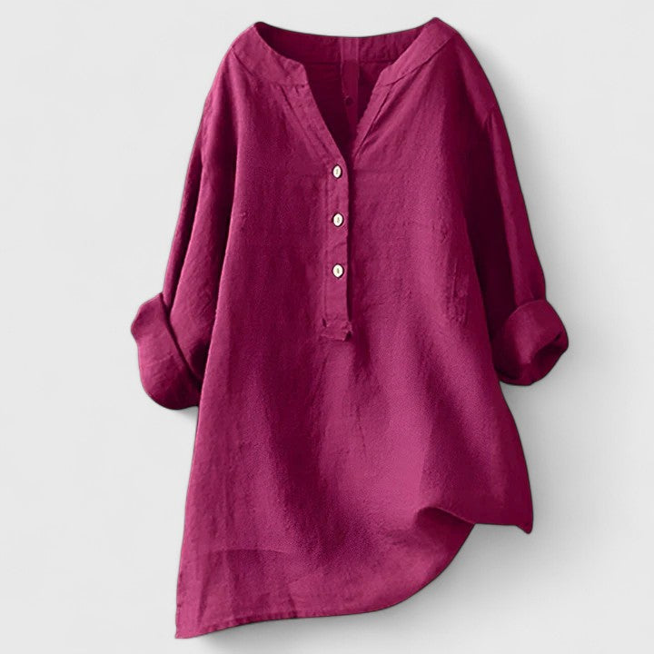 Red Larienne™ elegant button-front shirt by Emma & Rose Cape Town, shown on a model with a classic collar and long sleeves.