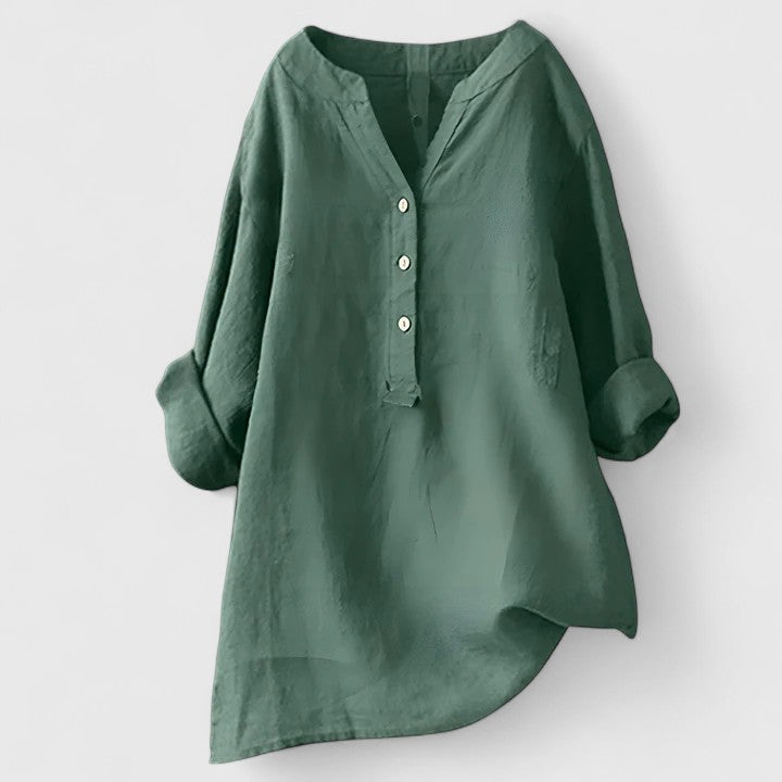 Red Larienne™ elegant button-front shirt by Emma & Rose Cape Town, shown on a model with a classic collar and long sleeves.