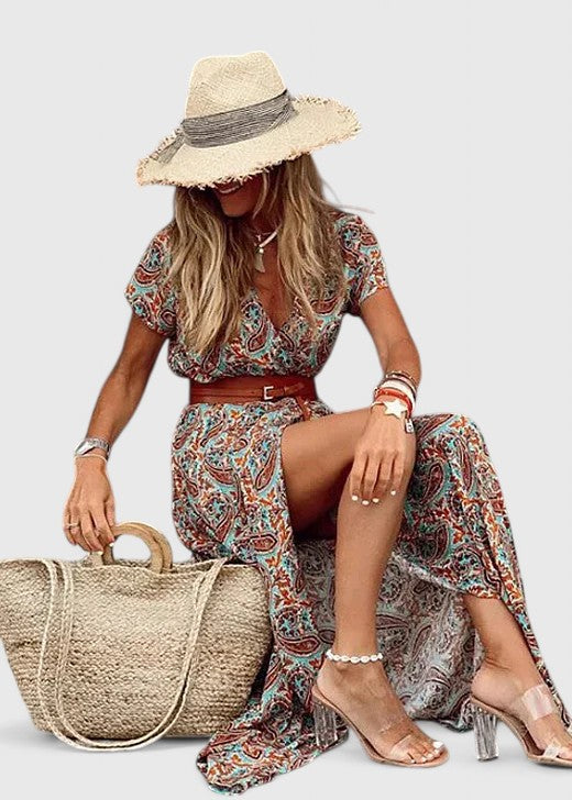 Red Lorraine™ boho maxi dress by Emma & Rose Cape Town, flowing fabric with bohemian style and intricate patterns.
