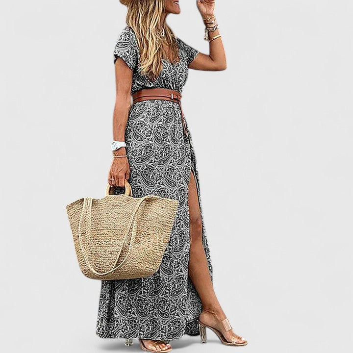 Emma & Rose Cape Town Lorraine™ stylish boho maxi dress in vibrant red, flowing fabric with intricate patterns and relaxed fit.