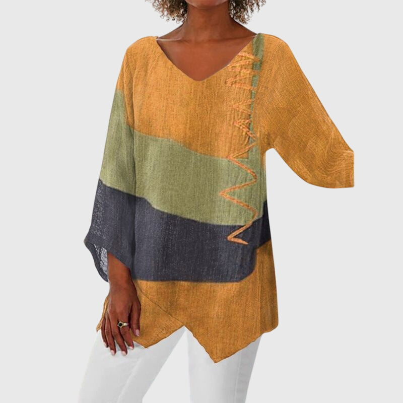 Red Nena™ Flattering Top by Emma & Rose Cape Town, featuring a stylish fit and soft fabric, displayed on a hanger.
