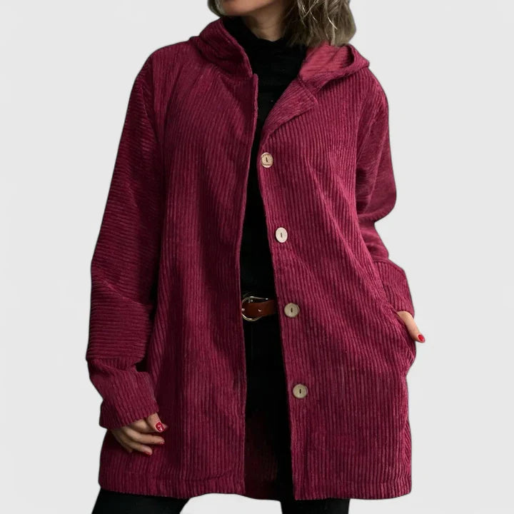 Red Ysalindah™ comfortable jacket by Emma & Rose Cape Town, shown on a hanger with a cozy, casual fit.