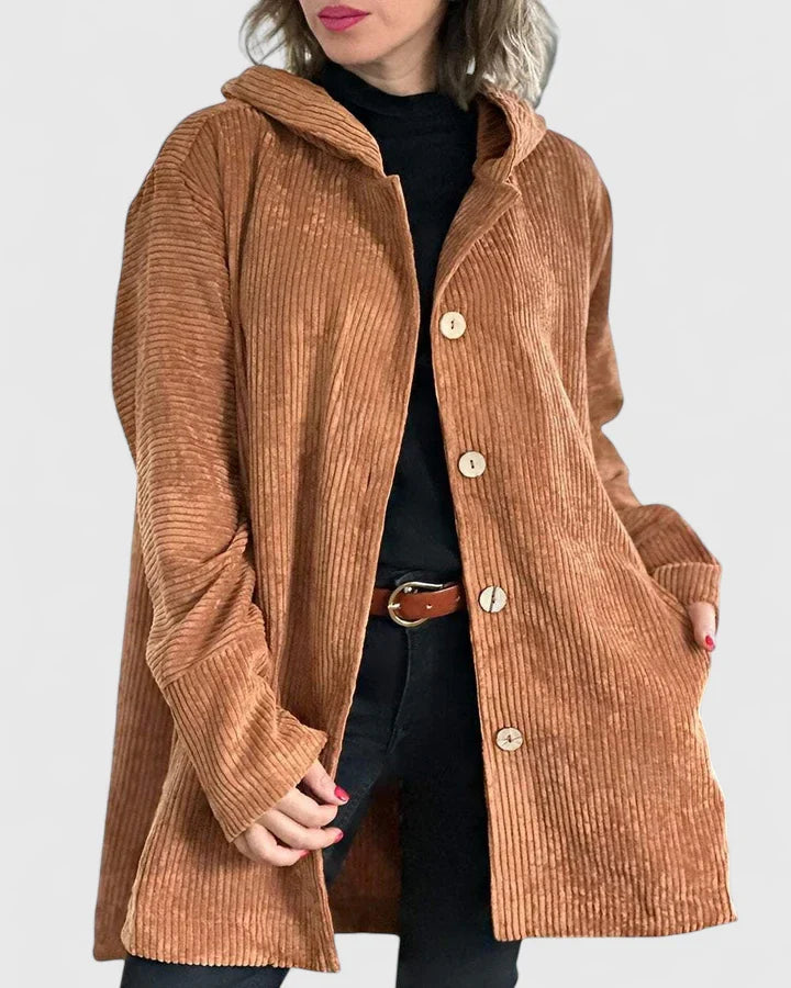 Red Ysalindah™ comfortable jacket by Emma & Rose Cape Town, shown on a hanger with detailed fabric texture.