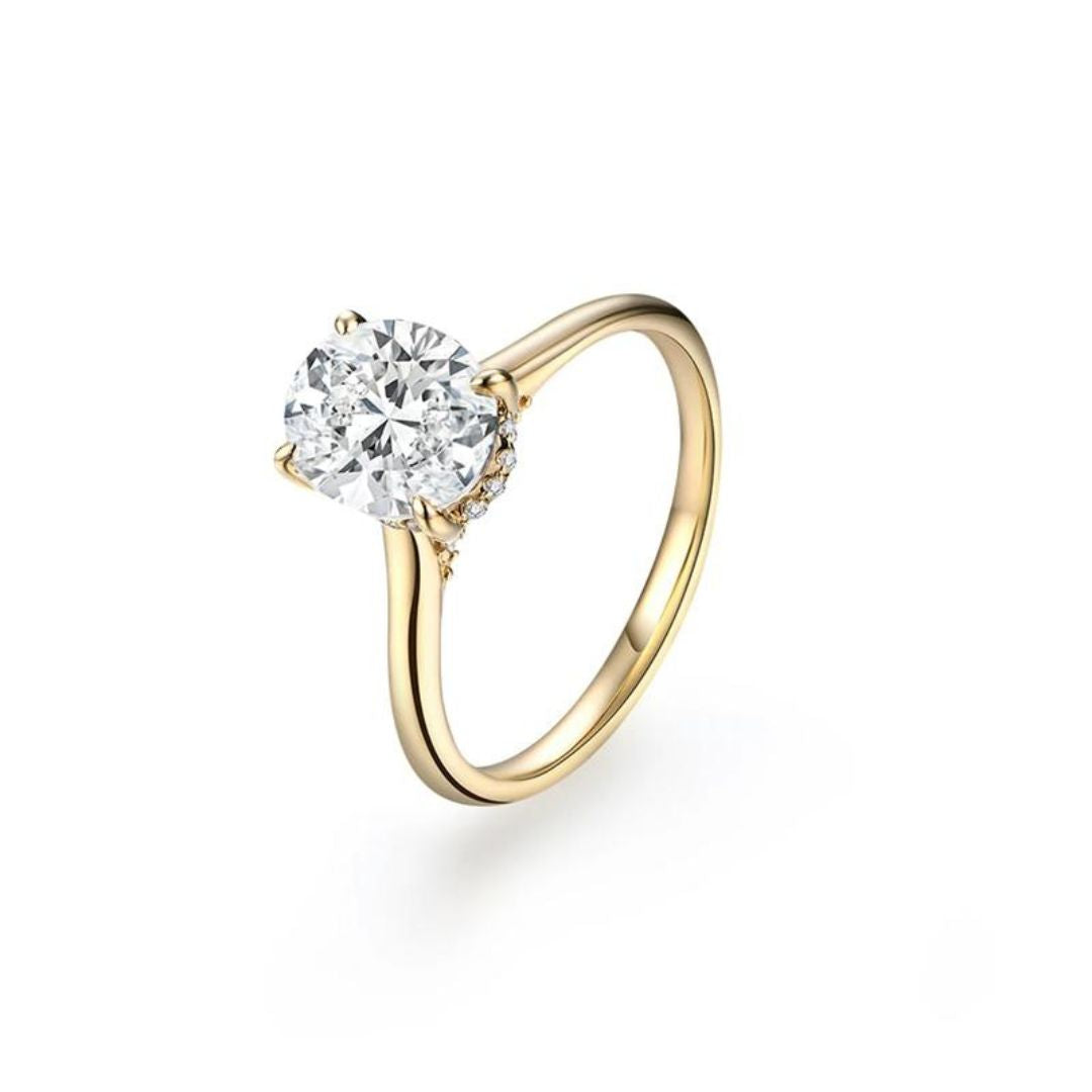 Emma & Rose Cape Town Arlenyssah™ 18k gold ring with intricate design and polished finish, showcased on a neutral background.