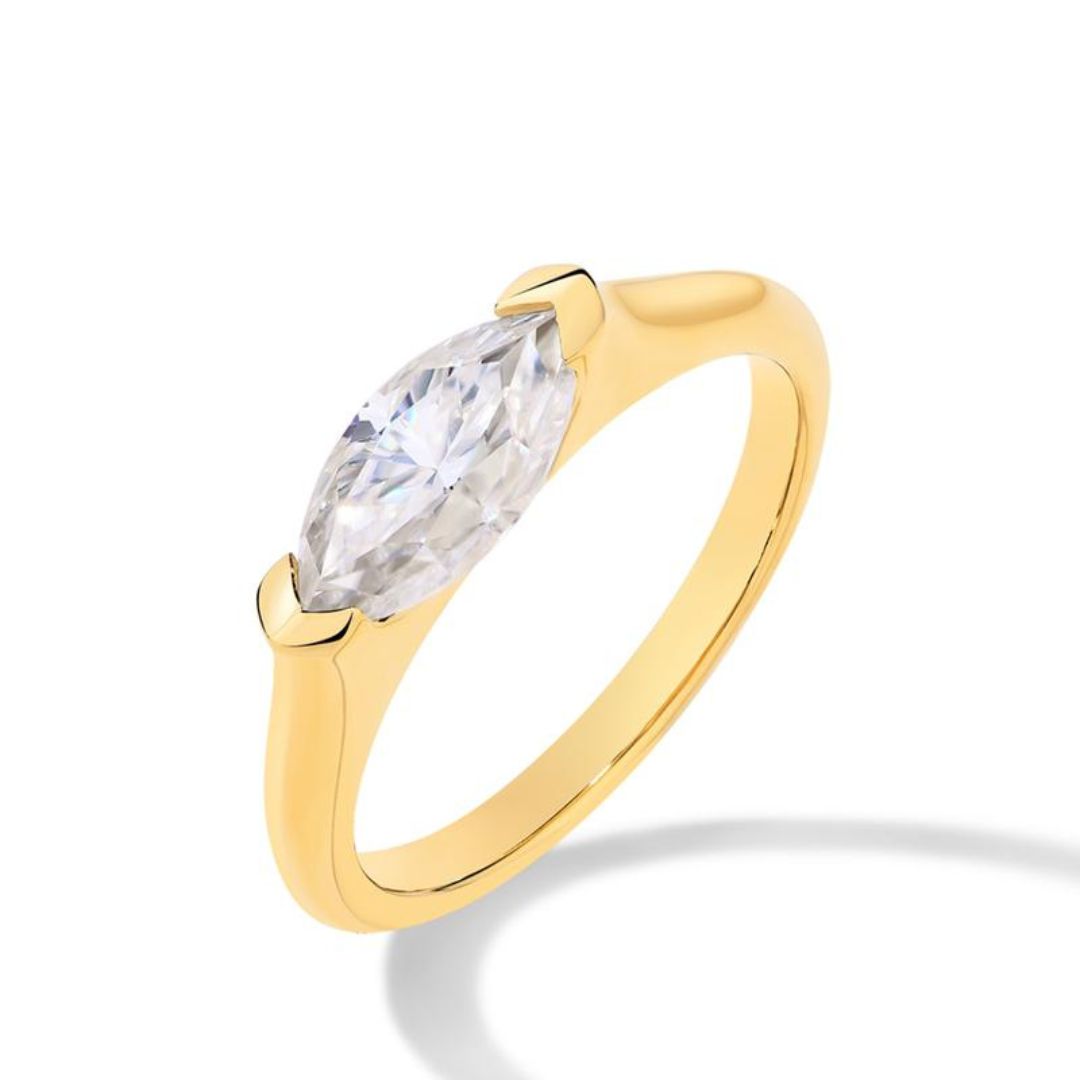 Emma & Rose Cape Town Avanirelle™ diamond ring in 18k gold with intricate band design, showcasing sparkling diamonds.