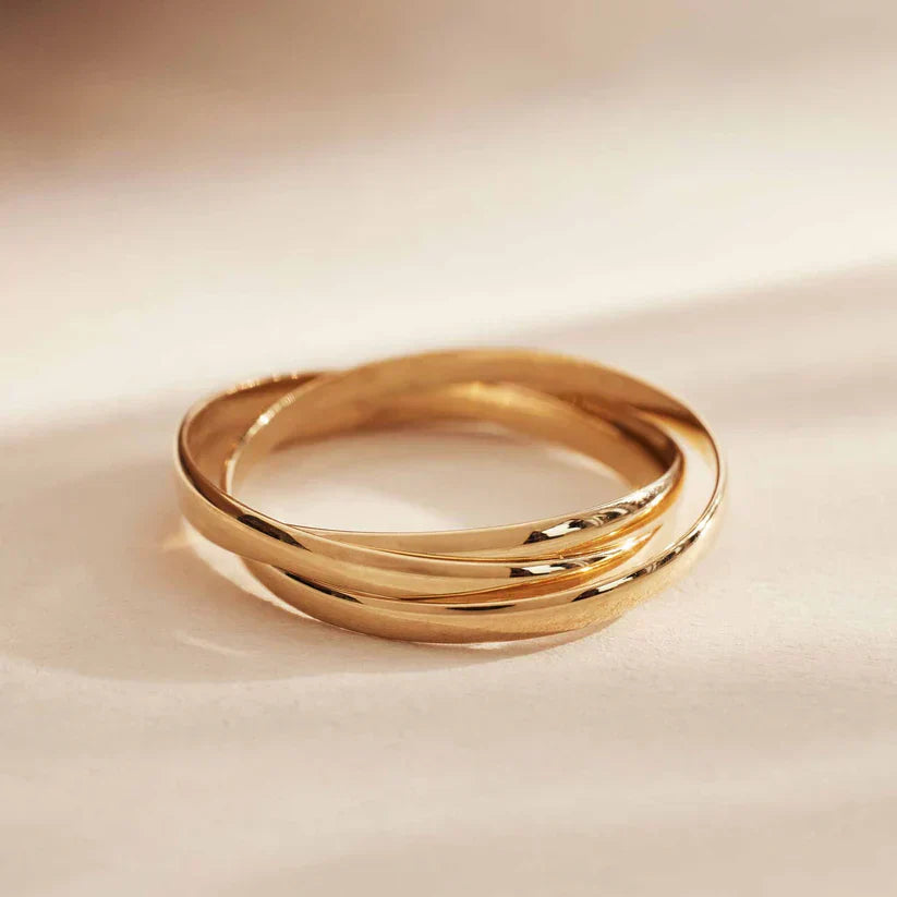 Isandrielle™ 18k gold ring by Emma & Rose Cape Town featuring a sleek, elegant design on a white background.
