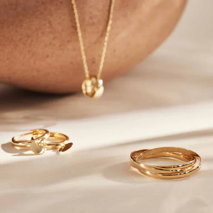 Isandrielle™ 18k gold ring by Emma & Rose Cape Town, featuring a sleek, elegant design in a close-up view