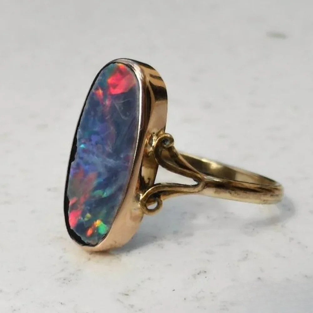 Retro™ Bunter Opal ring by Emma & Rose Cape Town featuring a colorful opal gemstone on a stylish ring band