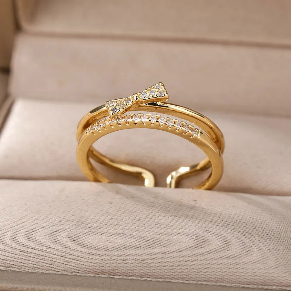 Emma & Rose Cape Town Maurelynn 18k gold adjustable ring with elegant design, featuring a smooth polished finish.