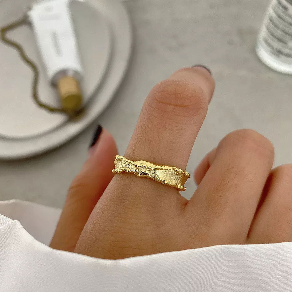 Adjustable 18k gold ring from Emma & Rose Cape Town's Melisaria collection, featuring elegant gold band and intricate design.