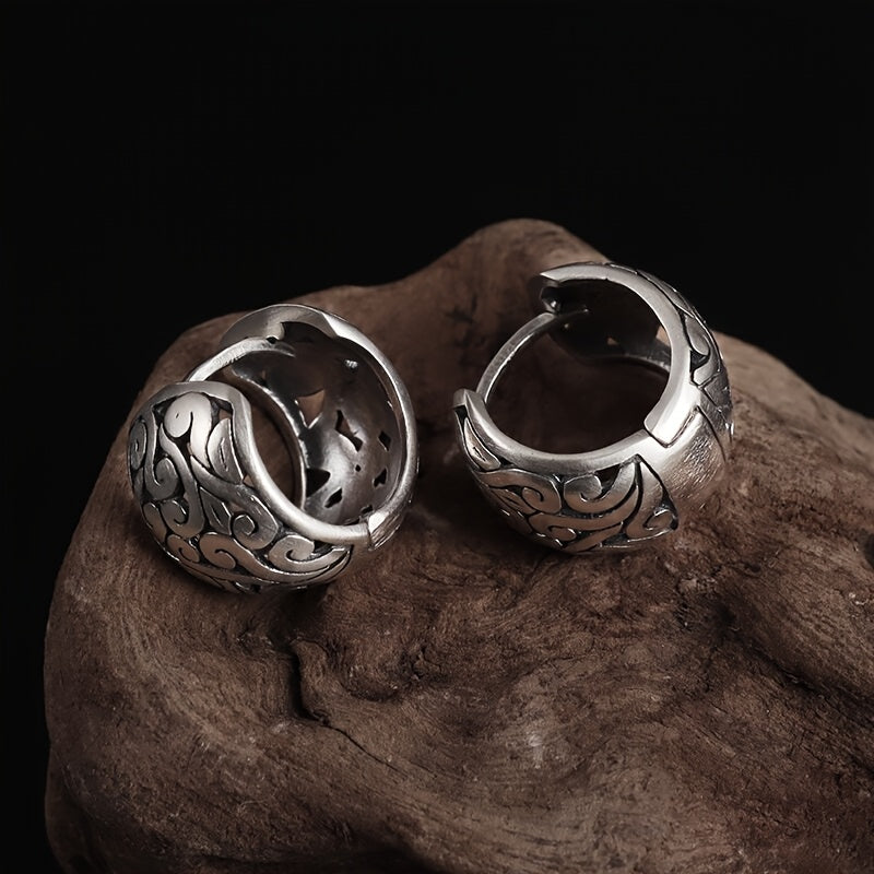 Vintage Relic earrings by Emma & Rose Cape Town featuring round, intricate metal designs on antique-style earrings.