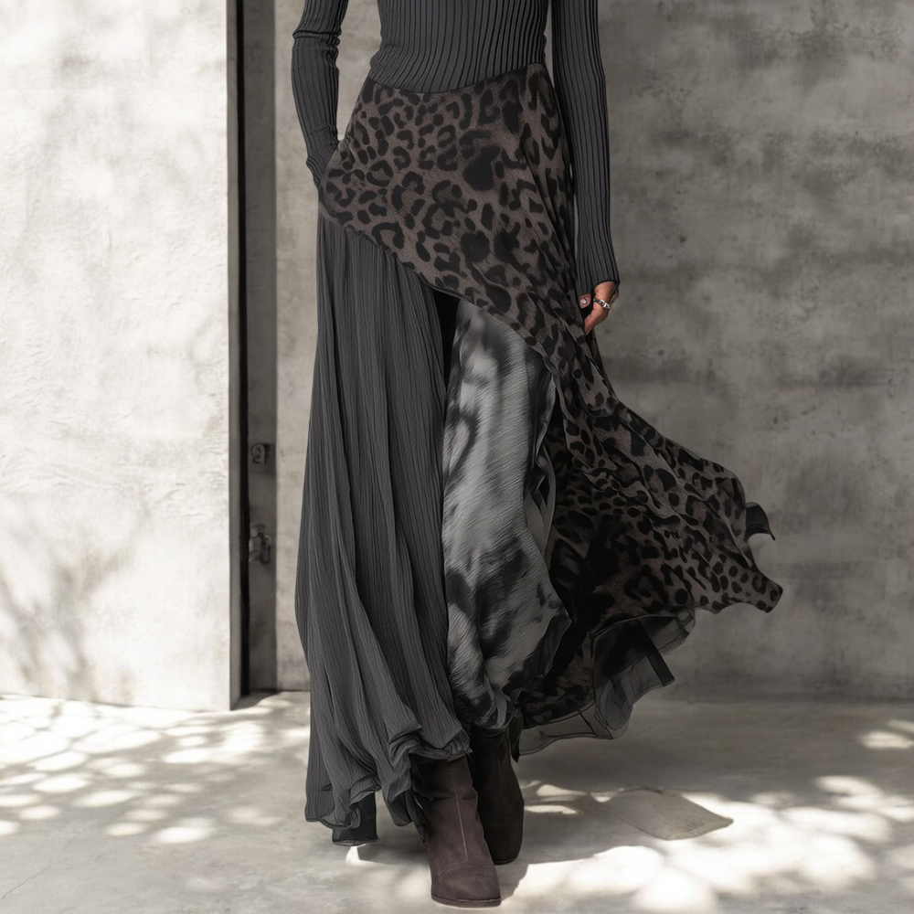 Fenna™ flowing long dress by Emma & Rose Cape Town, lightweight fabric, elegant design, and full-length silhouette.