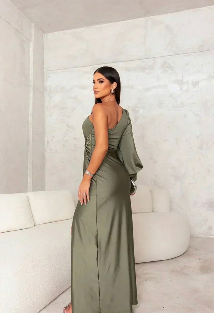 Green Claire™ one-shoulder evening maxi dress by Emma & Rose Cape Town, flowing fabric and elegant design for formal occasions.