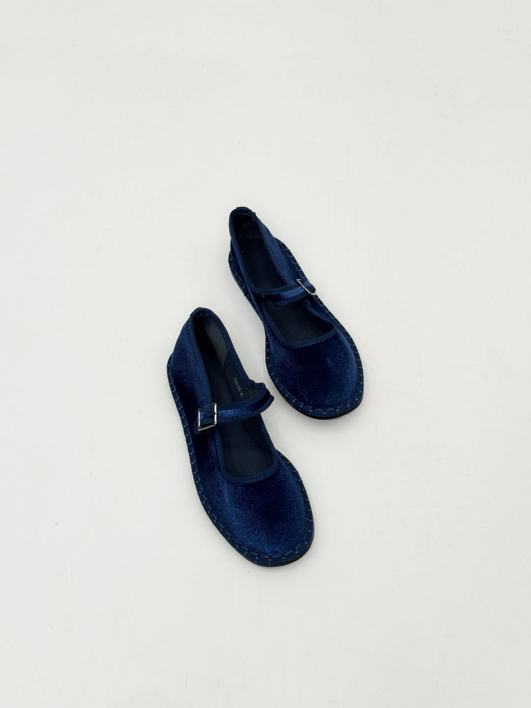 Black Bronwyn™ Friulane strap shoes by Emma & Rose Cape Town, showing stylish slip-on design with strap details.