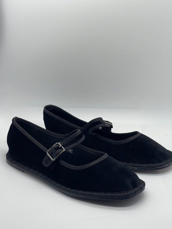 Black Bronwyn™ Friulane strap shoes by Emma & Rose Cape Town, featuring stylish slip-on design and comfortable flat soles.