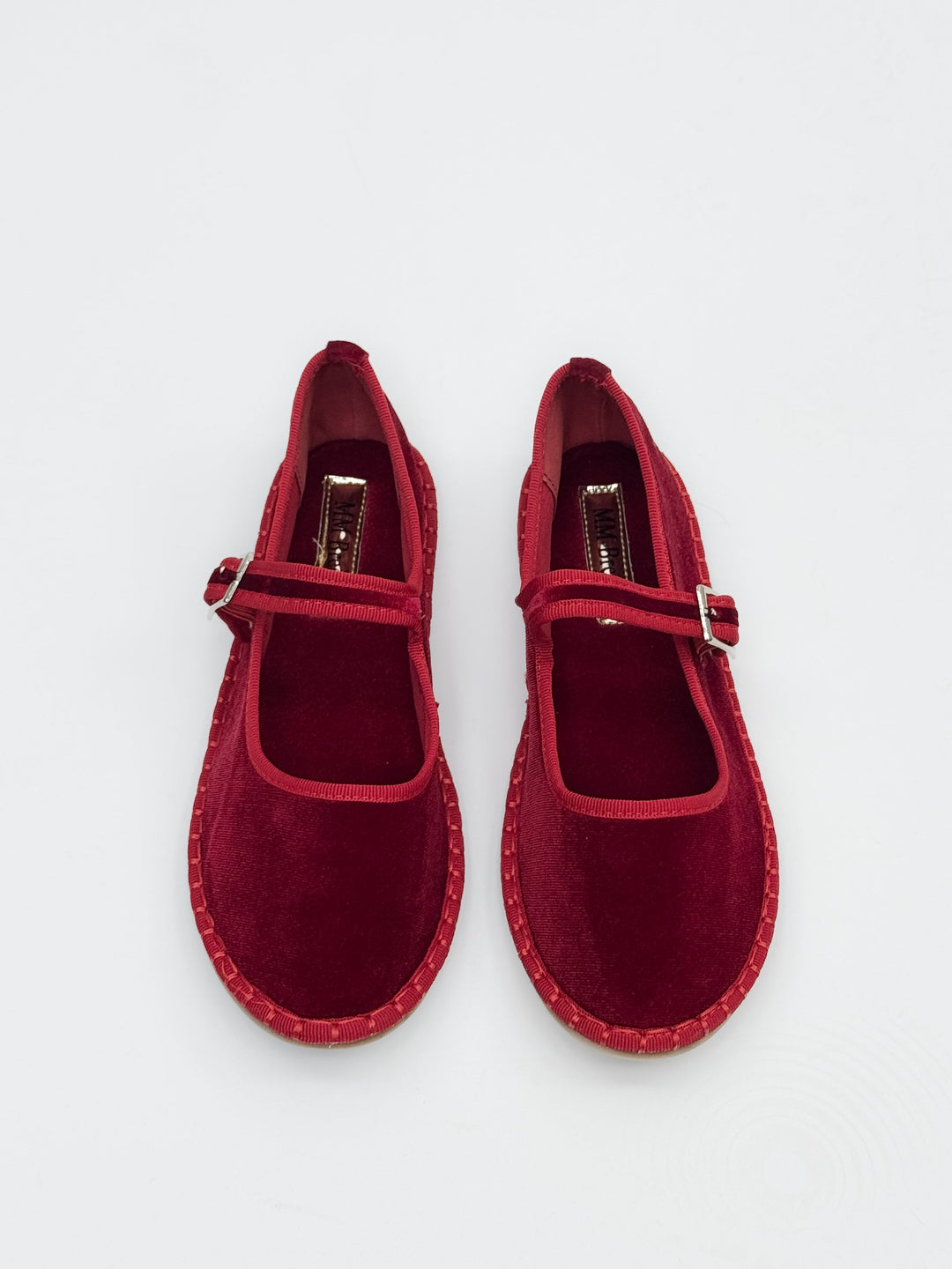 Black Bronwyn™ Friulane strap shoes from Emma & Rose Cape Town, showing stylish slip-on design and detailed straps.