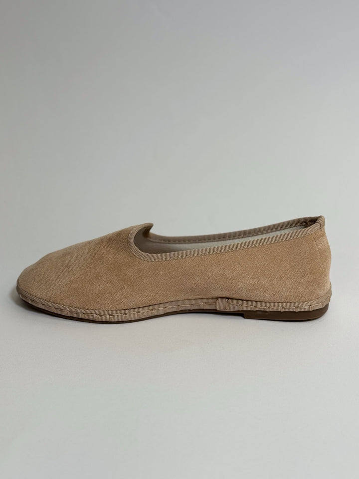 Black Delia™ Emma & Rose Cape Town Friulane slippers made from soft, luxurious fabrics, shown on size 36 foot.