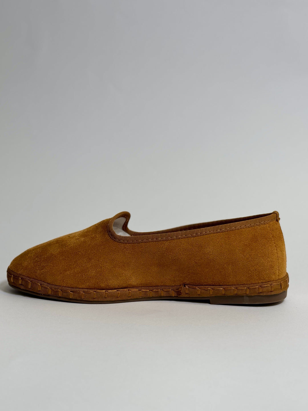 Black Delia™ Friulane shoes by Emma & Rose Cape Town, featuring soft luxurious fabric and elegant slip-on style.