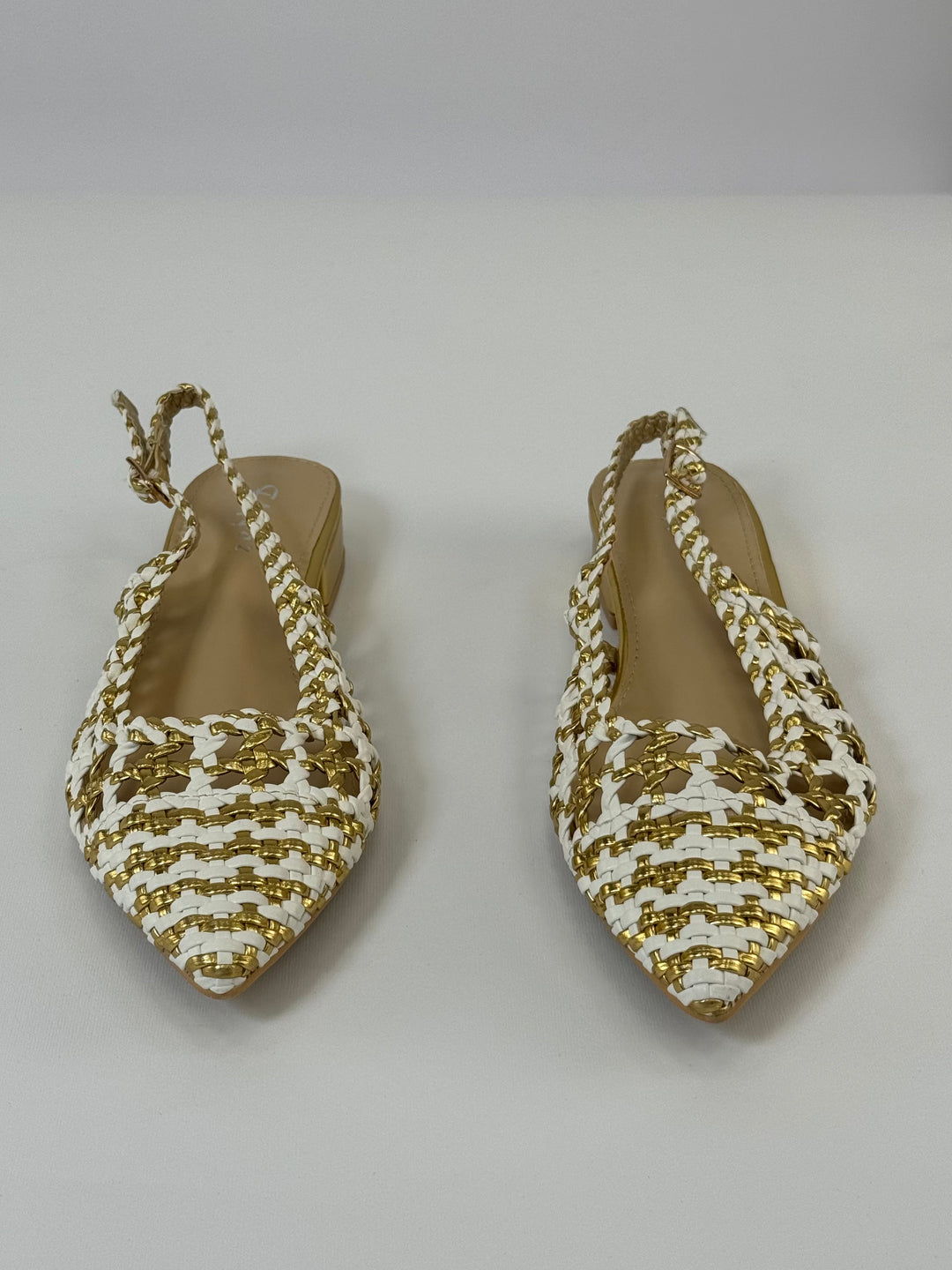 Black Pippa™ slingback sandals by Emma & Rose Cape Town with a sleek design, open heel, and ankle strap.