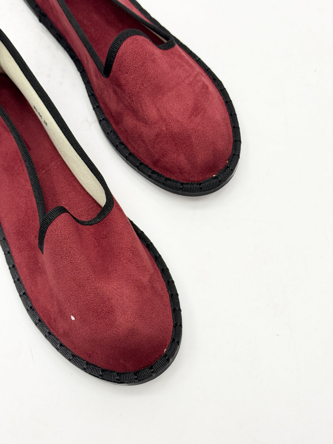 Emma & Rose Cape Town Viviane black Friulane slip-on shoes with soft luxurious fabrics and a stylish border detail.