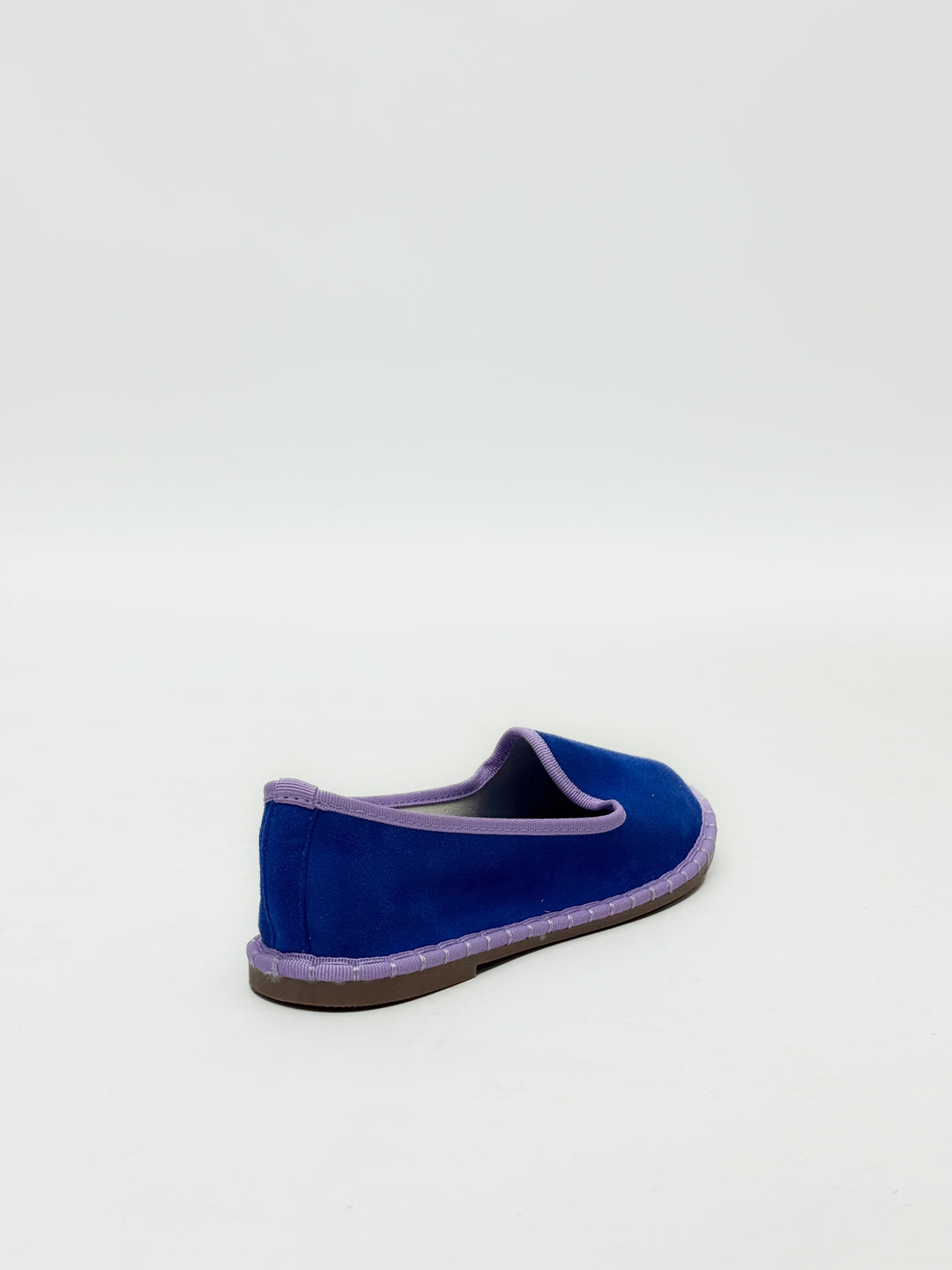 Black Viviane™ Friulane border slippers by Emma & Rose Cape Town featuring soft, luxurious fabrics and comfortable slip-on style.
