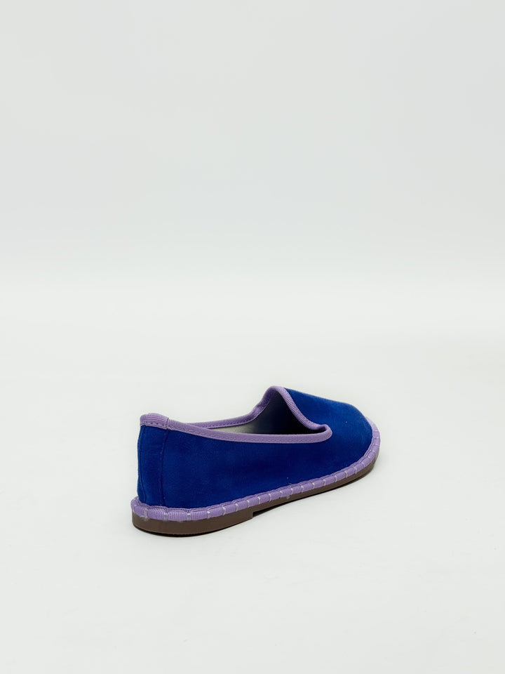 Black Viviane™ Friulane border slippers by Emma & Rose Cape Town featuring soft, luxurious fabrics and comfortable slip-on style.