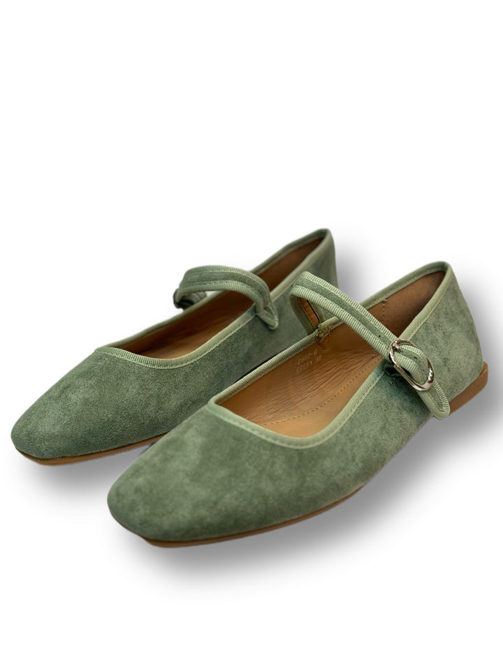 Black Yolande™ ballet flats with strap by Emma & Rose Cape Town, showcasing stylish slip-on footwear with a sleek design.