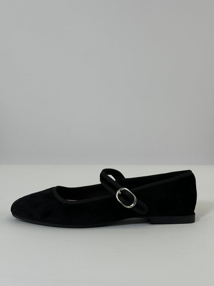 Black Yolande™ ballet flats with strap by Emma & Rose Cape Town, showing the stylish, comfortable shoe with ankle strap detail.