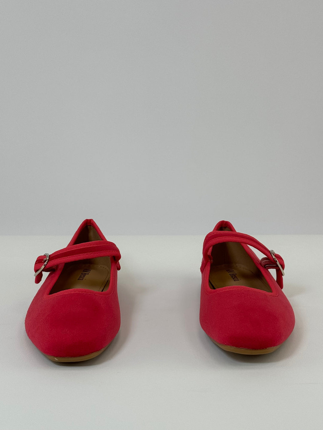 Black Yolande™ ballet flats with strap from Emma & Rose Cape Town, featuring a sleek slip-on design and comfortable fit.