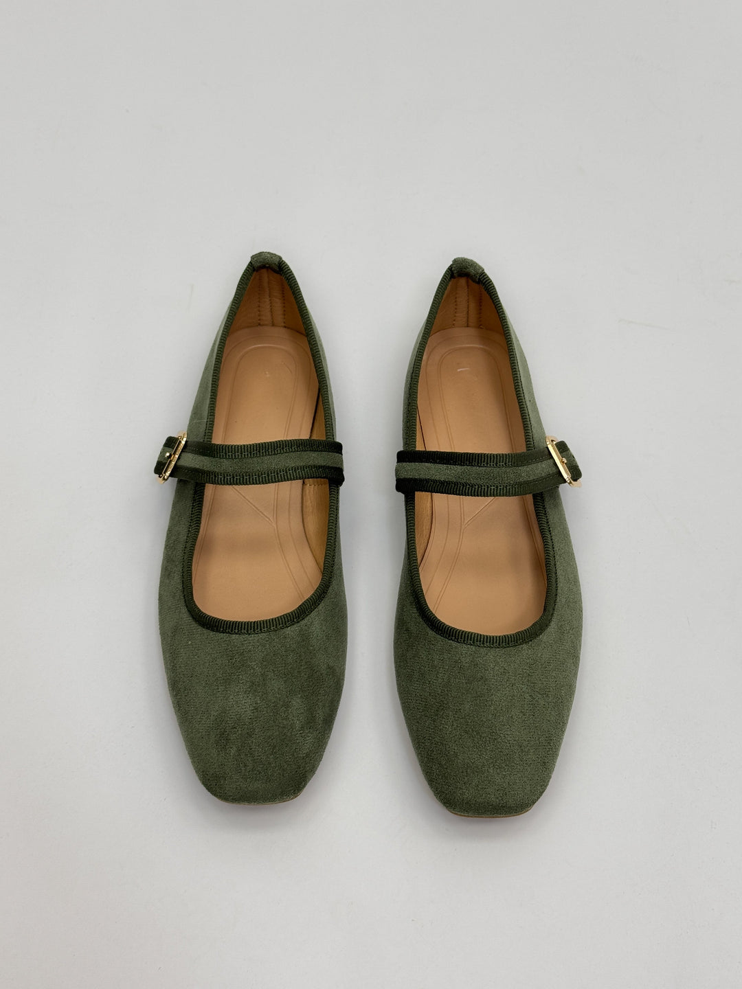 Black Yolande™ ballet flats with strap by Emma & Rose Cape Town, showcasing the elegant design and comfortable fit.