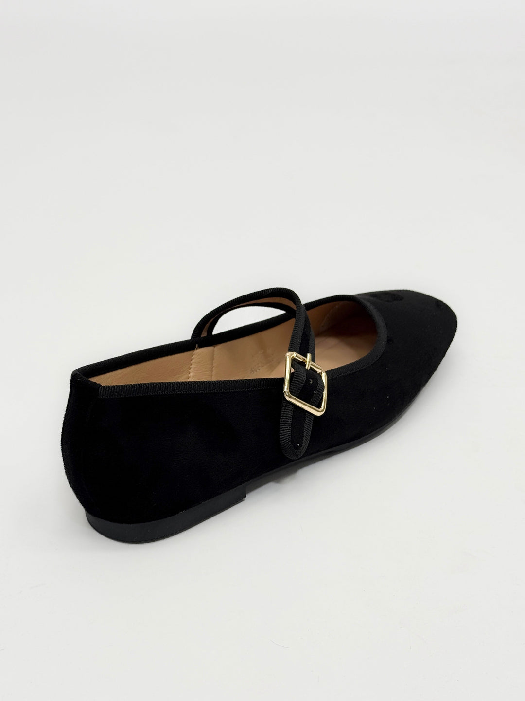 Black Yolande™ ballet flats with strap by Emma & Rose Cape Town, showcasing comfortable slip-on shoes with stylish design.