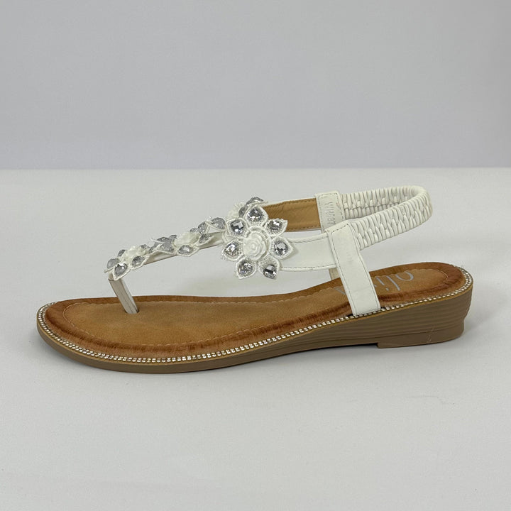 Blue Margot™ Jewelled Flip-flops by Emma & Rose Cape Town, stylish scarpe with decorative jewels and comfortable soles.