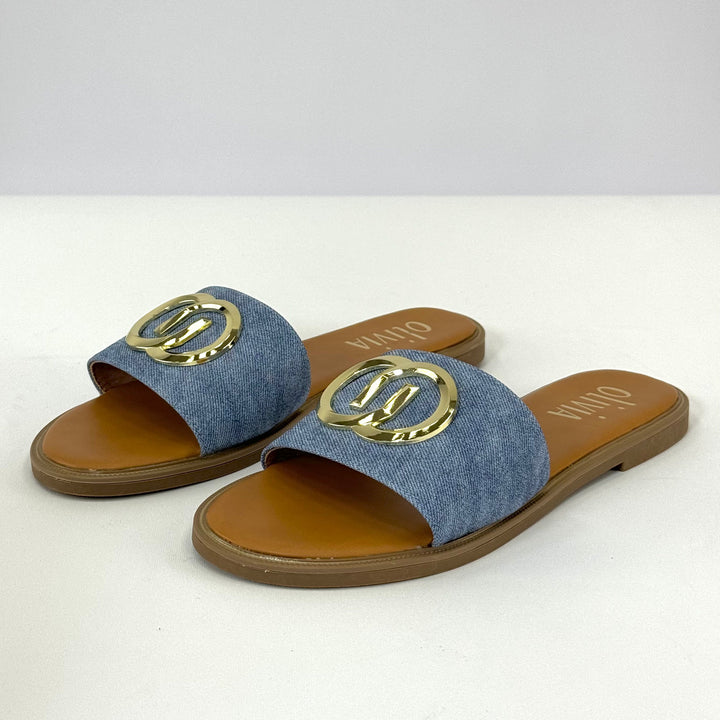 Dark blue GG™ logo slippers by Emma & Rose Cape Town, stylish slip-on shoes with branded design and comfortable fabric.