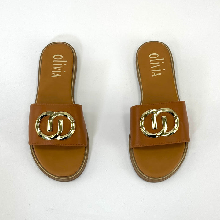 Dark blue GG™ logo slippers by Emma & Rose Cape Town, slip-on shoes with comfortable design and branded logo detail.