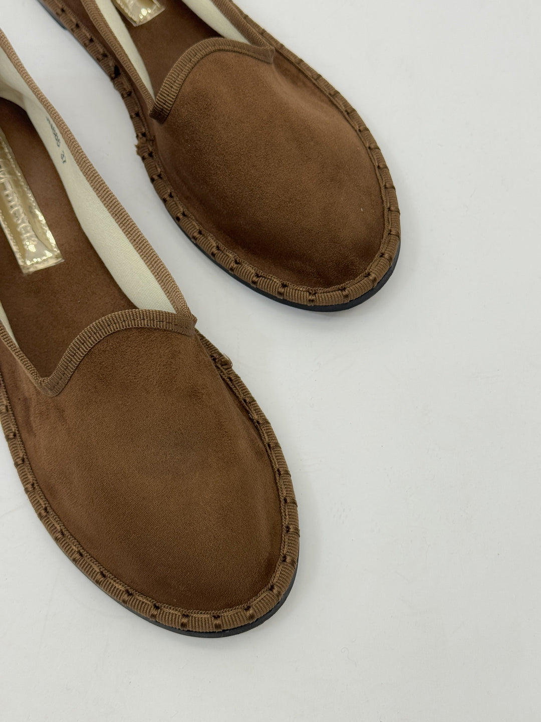 Electric blue Emma & Rose Cape Town Amber Friulane slippers made of soft luxurious fabrics for comfortable style.