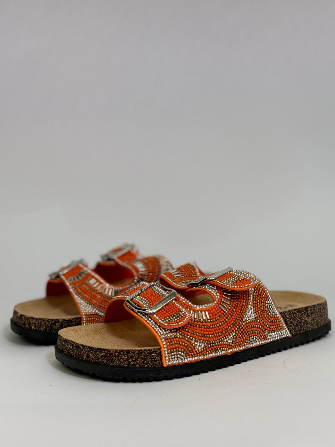 Orange Merano™ chic sandals by Emma & Rose Cape Town, stylish slip-on shoes with a comfortable design.