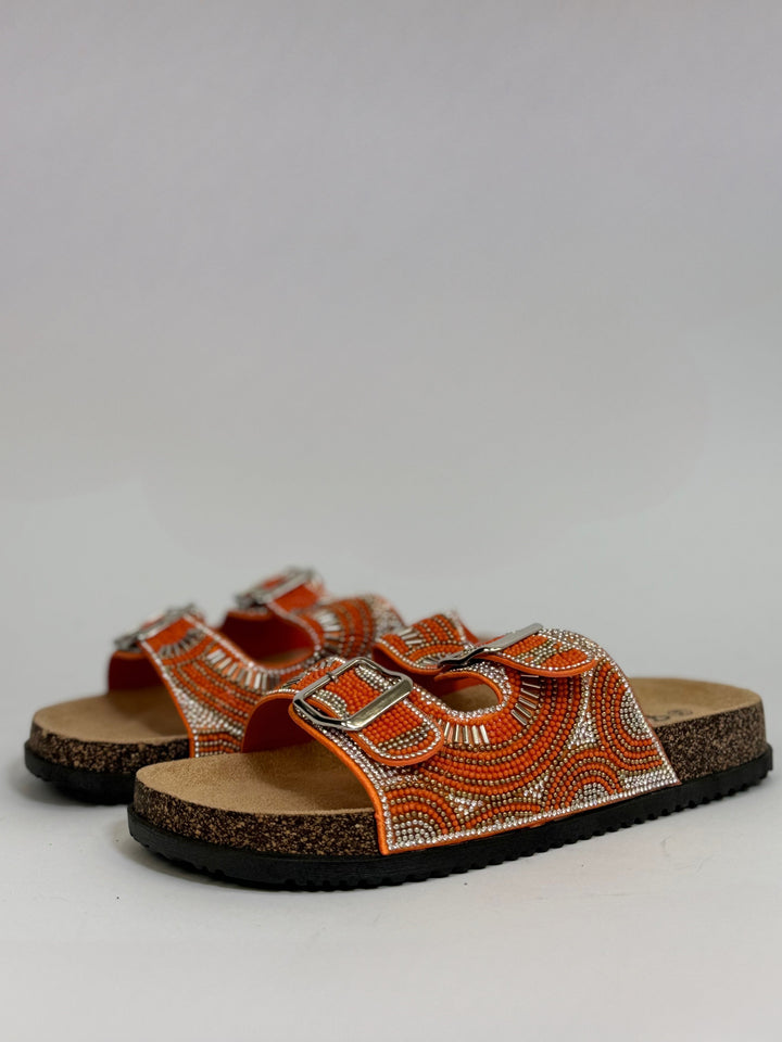 Orange Merano™ chic sandals by Emma & Rose Cape Town, stylish slip-on shoes with a comfortable design.