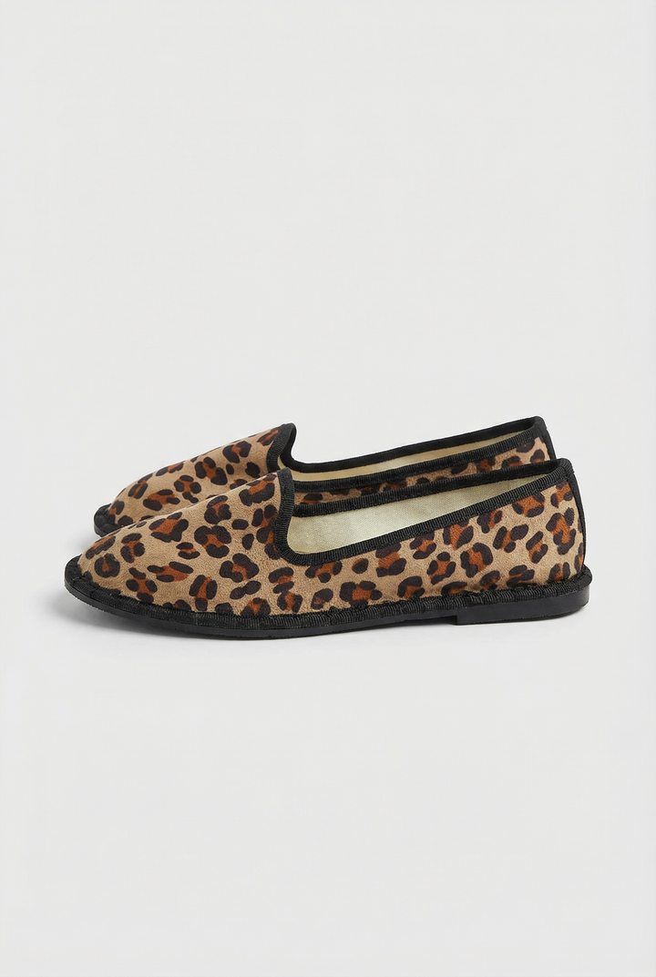 Willemien animal print Friulane slippers by Emma & Rose Cape Town featuring soft luxurious fabrics and slip-on design.