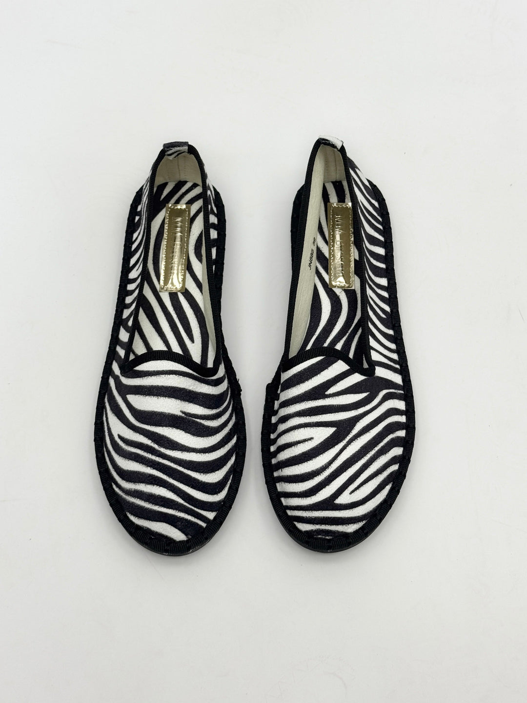 Animal print Willemien™ Friulane slippers from Emma & Rose Cape Town featuring soft, luxurious fabrics and stylish slip-on design.