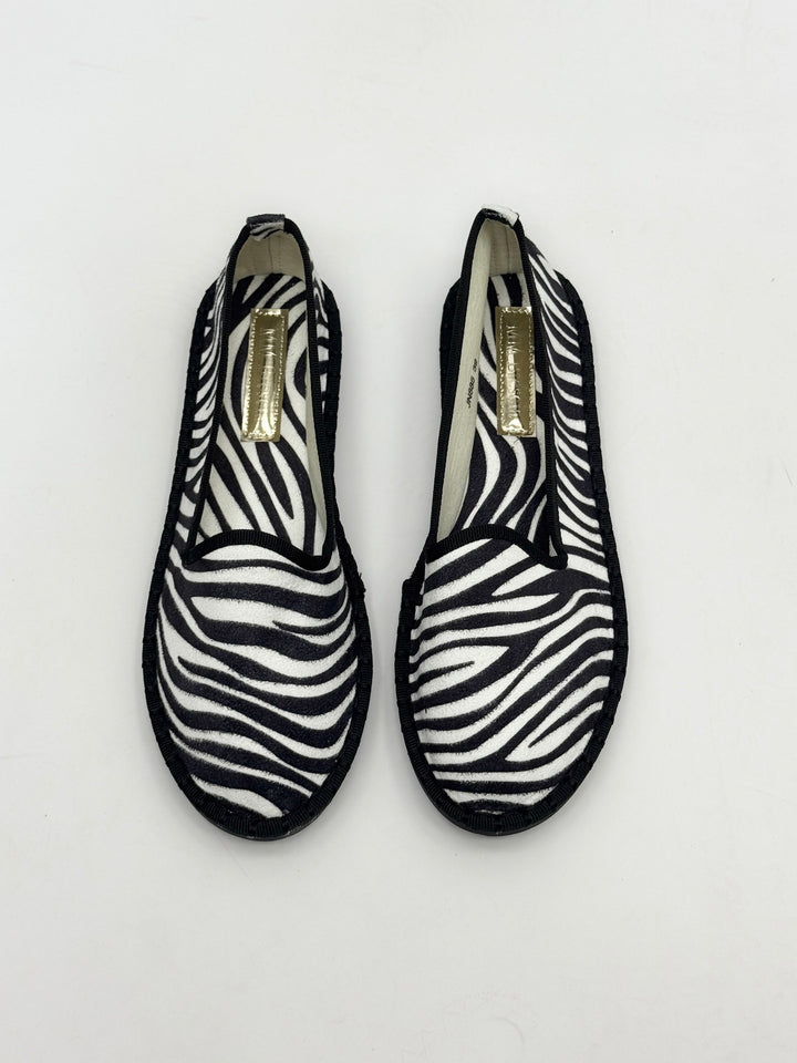 Animal print Willemien™ Friulane slippers from Emma & Rose Cape Town featuring soft, luxurious fabrics and stylish slip-on design.