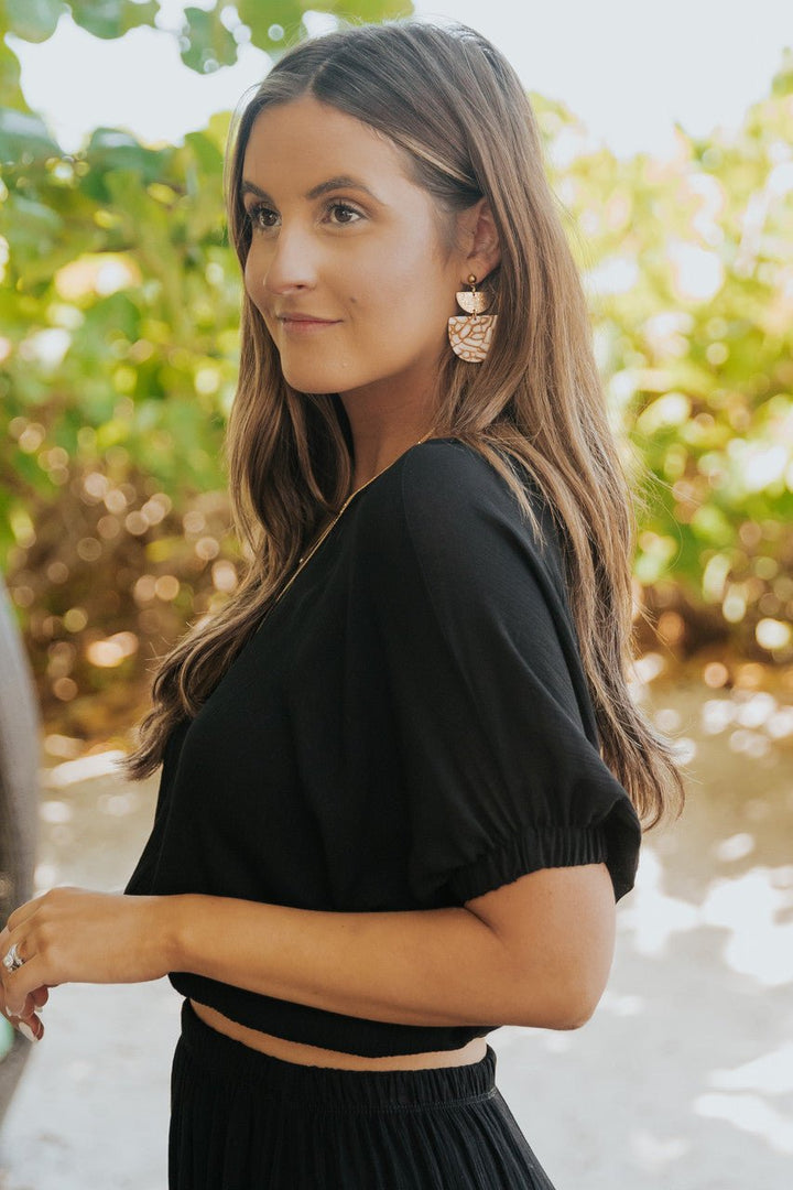 Emma & Rose Cape Town Lisa™ black maxi skirt set featuring a stylish, flowing skirt and matching top in a sleek black design.