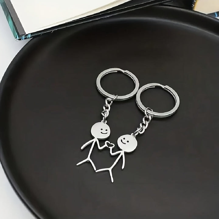 Two-piece Jacoba™ family jewelry set by Emma & Rose Cape Town featuring silver-like finish and adorable family-themed design