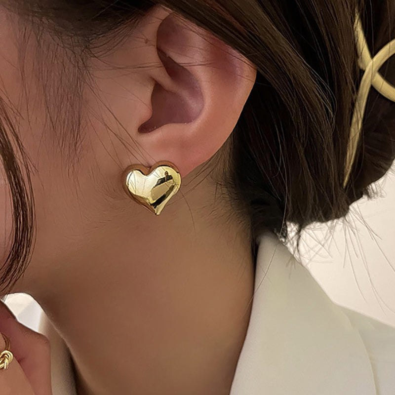 Silver Rina™ Elegant Heart Earrings by Emma & Rose Cape Town, featuring delicate heart-shaped design and polished finish.