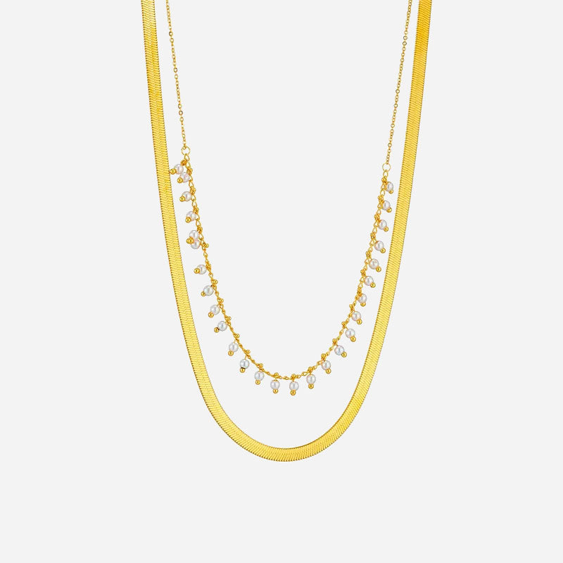 Marizanne™ Pearl Jewellery Set by Emma & Rose Cape Town featuring elegant pearl earrings and necklace in a matching jewelry set.