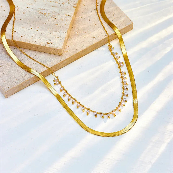 Marizanne™ Pearl Jewellery Set by Emma & Rose Cape Town featuring elegant pearl necklace and matching earrings.