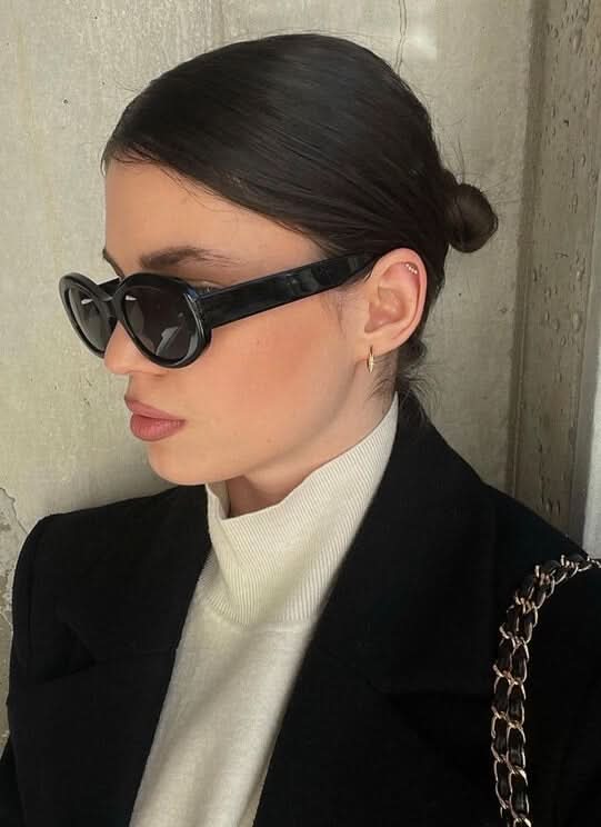 Black Averi™ sleek sunglasses by Emma & Rose Cape Town with a modern, minimalist design and tinted lenses.