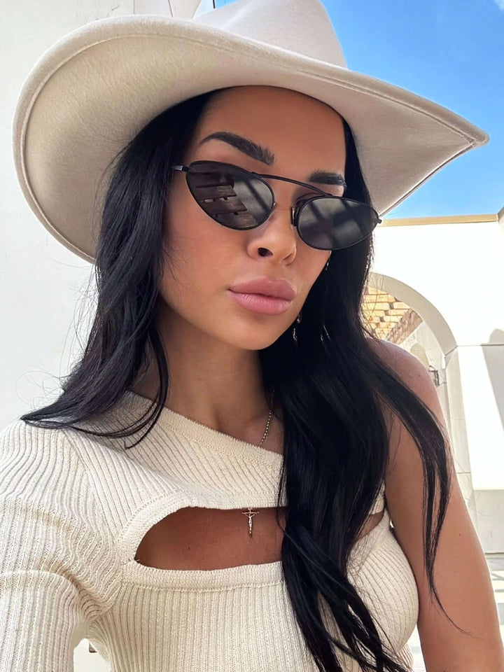 Navaya™ Luxe sunglasses by Emma & Rose Cape Town featuring black frame and stylish design.