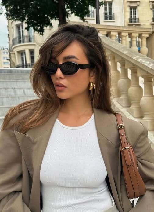 Black Ryelle™ minimalist sunglasses by Emma & Rose Cape Town, featuring sleek, modern design and UV protection.