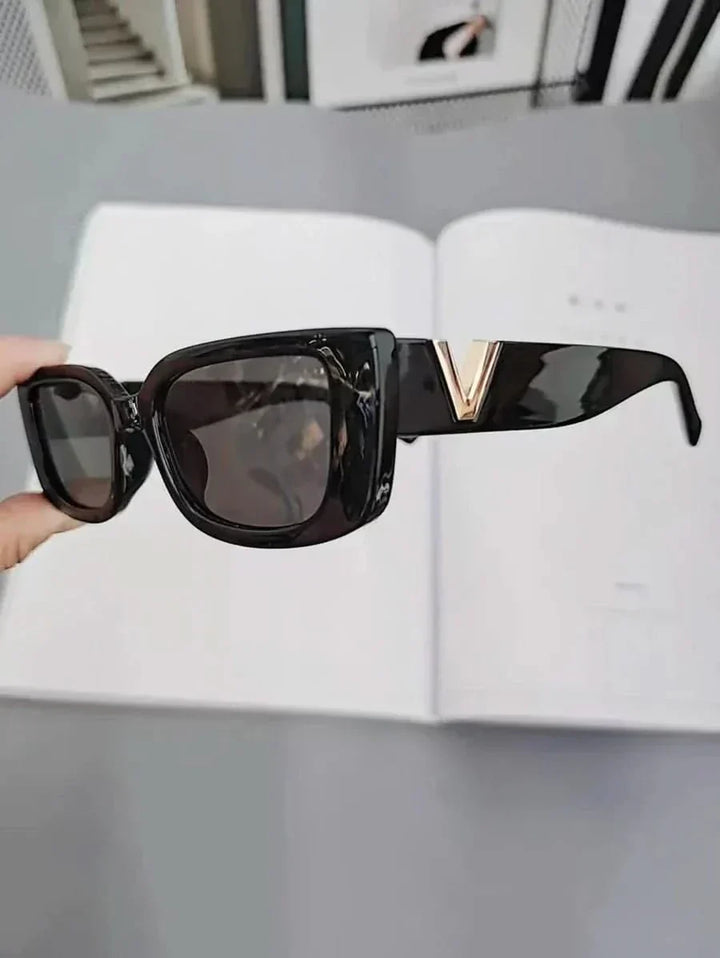 Taytum™ Edgy sunglasses by Emma & Rose Cape Town featuring bold, modern sunglasses with dark lenses and stylish frame.