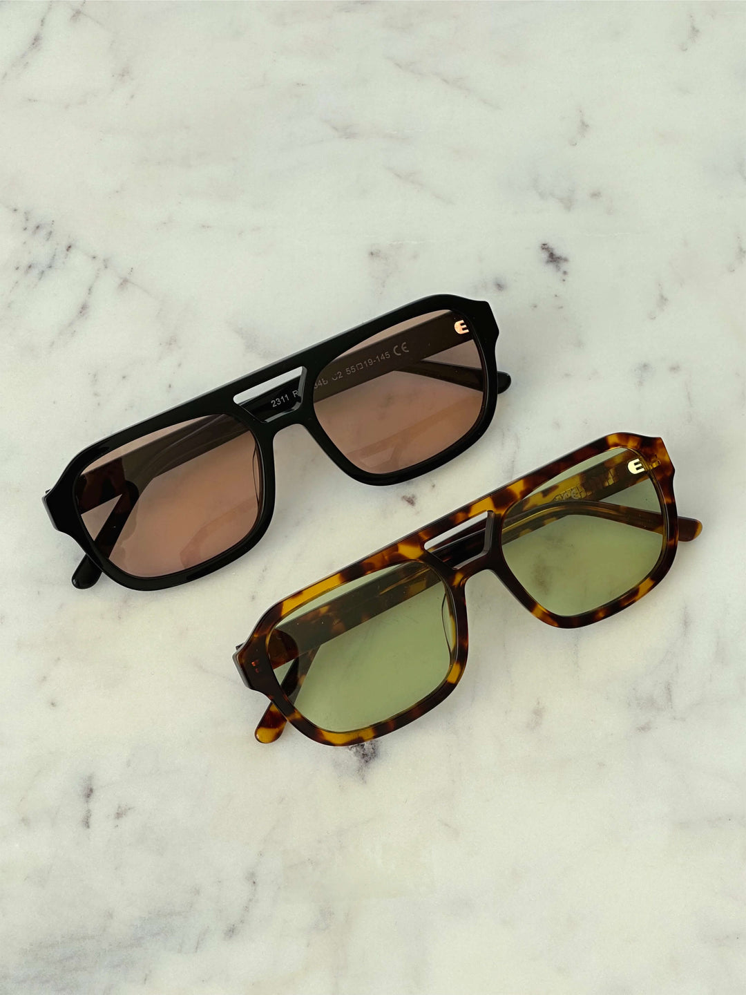 Emma & Rose Cape Town Jaslynn™ elegant tortoiseshell and green sunglasses with stylish frame and tinted lenses.